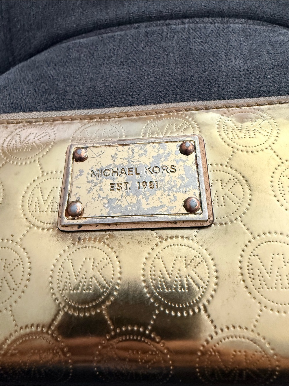 Michael Kors Metallic Gold Embossed Logo wristlet